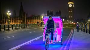 London rickshaw at night
